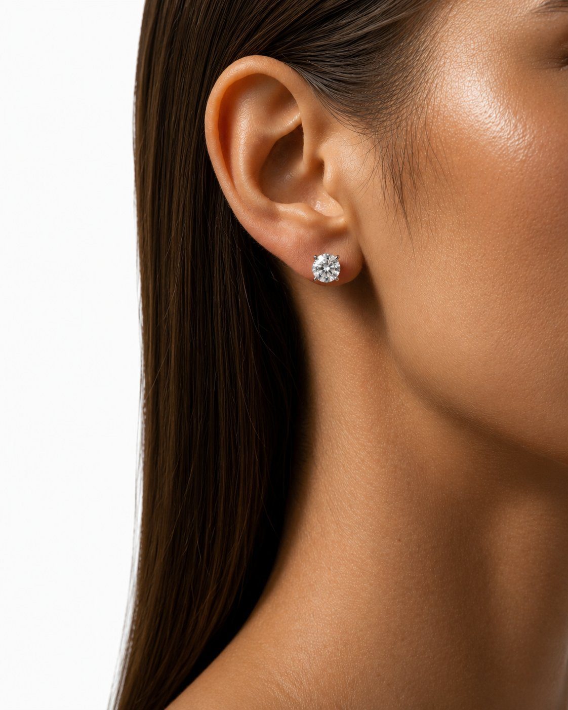 Model wearing diamond studs