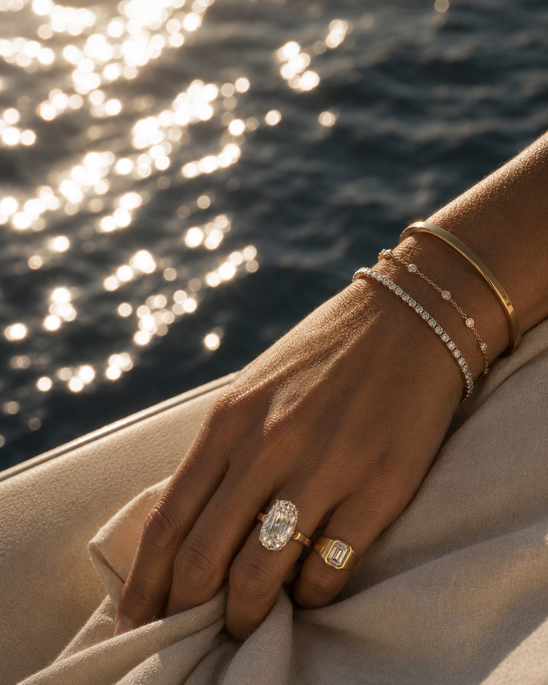 Diamond rings and bracelets on the hand